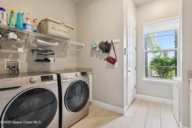 1025 Aranceto Cir, Merritt Island, FL 32952 - washroom featuring washer and dryer and baseboards