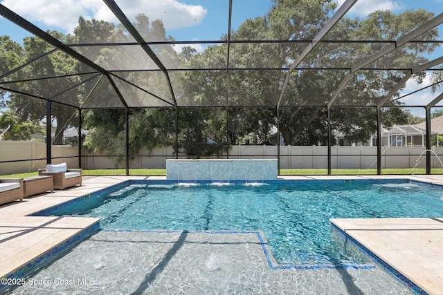 1025 Aranceto Cir, Merritt Island, FL 32952 - view of pool featuring a patio, a fenced backyard, glass enclosure, and outdoor lounge area