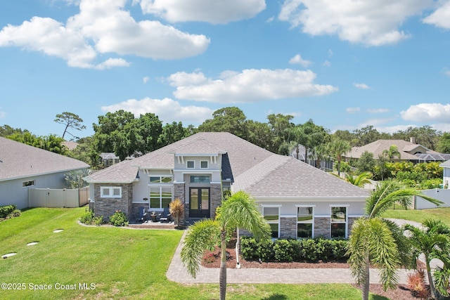 1025 Aranceto Cir, Merritt Island, FL 32952 - view of front of property with stone siding, french doors, and stucco siding