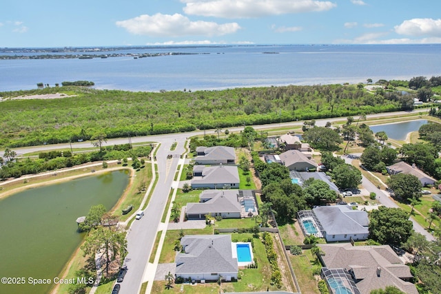 1025 Aranceto Cir, Merritt Island, FL 32952 - aerial perspective of suburban area with a large body of water