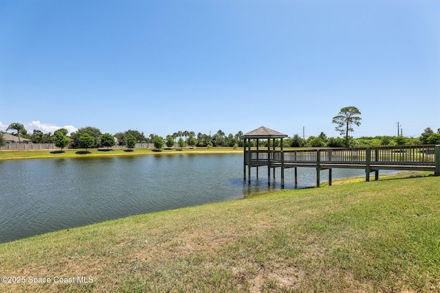 1025 Aranceto Cir, Merritt Island, FL 32952 - dock featuring a gazebo, a yard, and a water view