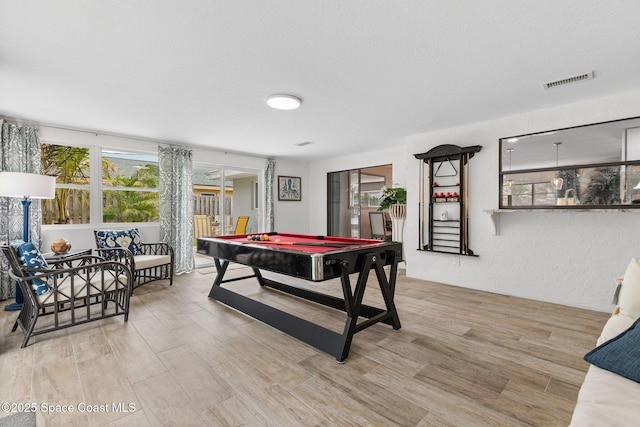 715 Atlantic Dr, Satellite Beach, FL 32937 - playroom with pool table and wood finished floors