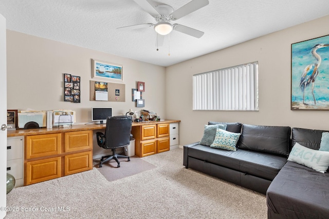 715 Atlantic Dr, Satellite Beach, FL 32937 - office area with light colored carpet, ceiling fan, and a textured ceiling