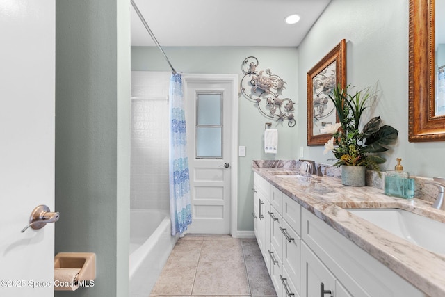 715 Atlantic Dr, Satellite Beach, FL 32937 - bathroom with double vanity, tile patterned floors, and shower / tub combo with curtain