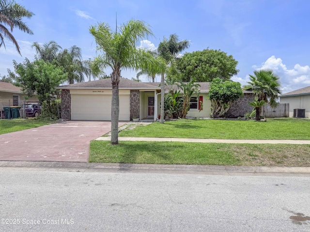 1395 Angler St, Merritt Island, FL 32952 - single story home featuring cooling unit, a garage, driveway, a front lawn, and stucco siding