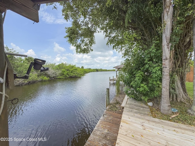 1395 Angler St, Merritt Island, FL 32952 - dock area featuring a water view