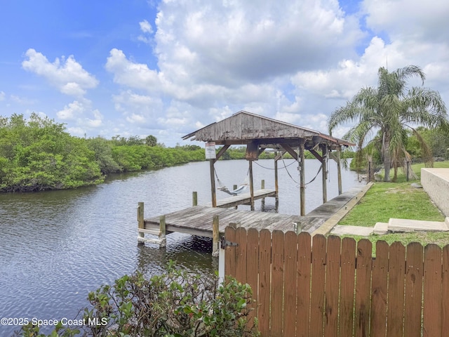 1395 Angler St, Merritt Island, FL 32952 - dock featuring a water view and boat lift