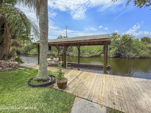 1395 Angler St, Merritt Island, FL 32952 - dock area featuring a water view