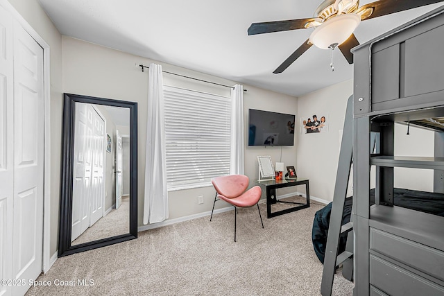 4236 Pondapple Dr, Titusville, FL 32796 - home office featuring carpet, baseboards, and ceiling fan