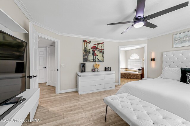 4236 Pondapple Dr, Titusville, FL 32796 - bedroom with crown molding, light wood-style floors, baseboards, ensuite bathroom, and ceiling fan