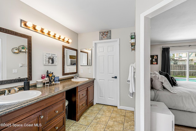 4236 Pondapple Dr, Titusville, FL 32796 - bathroom featuring double vanity, ensuite bath, and tile patterned flooring