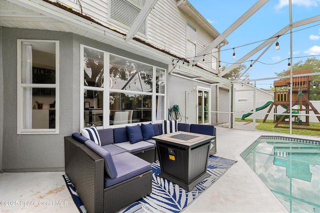 4236 Pondapple Dr, Titusville, FL 32796 - view of patio / terrace with an outdoor living space with a fire pit, an outdoor pool, and a playground
