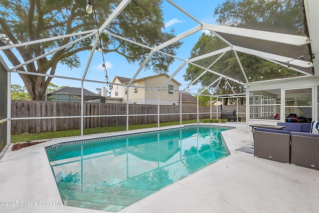 4236 Pondapple Dr, Titusville, FL 32796 - view of pool featuring a patio area, a fenced backyard, an outdoor living space, and glass enclosure