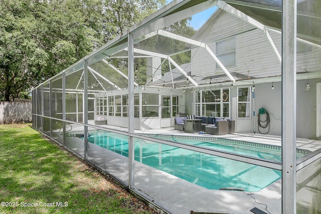4236 Pondapple Dr, Titusville, FL 32796 - view of swimming pool with a patio area, a lanai, and an outdoor hangout area