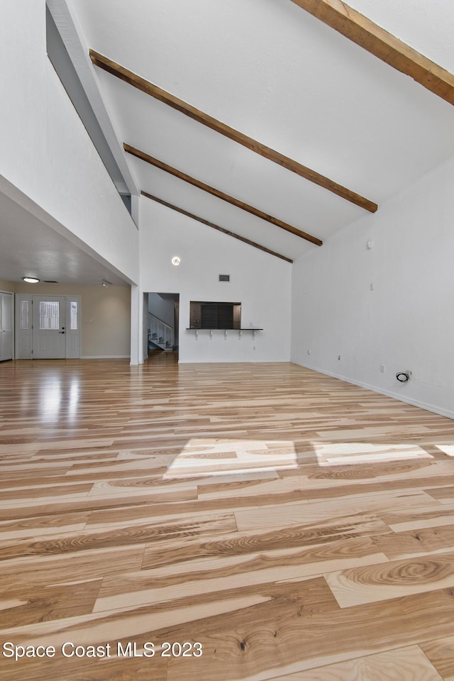 105 Osprey Ct, Melbourne, FL 32940 - unfurnished living room featuring wood finished floors