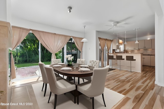105 Osprey Ct, Melbourne, FL 32940 - dining room featuring a ceiling fan