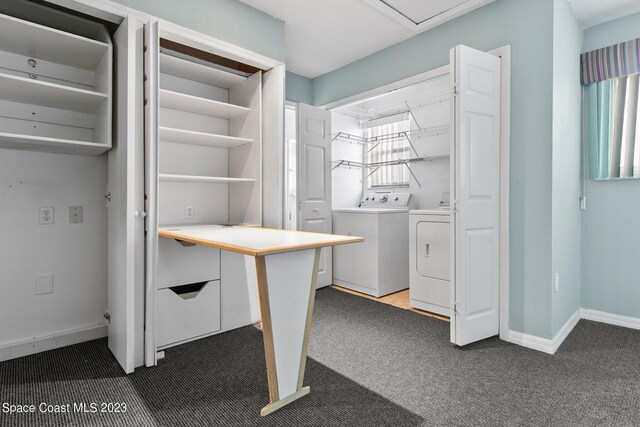 105 Osprey Ct, Melbourne, FL 32940 - unfurnished office featuring washing machine and dryer, dark carpet, healthy amount of natural light, and baseboards