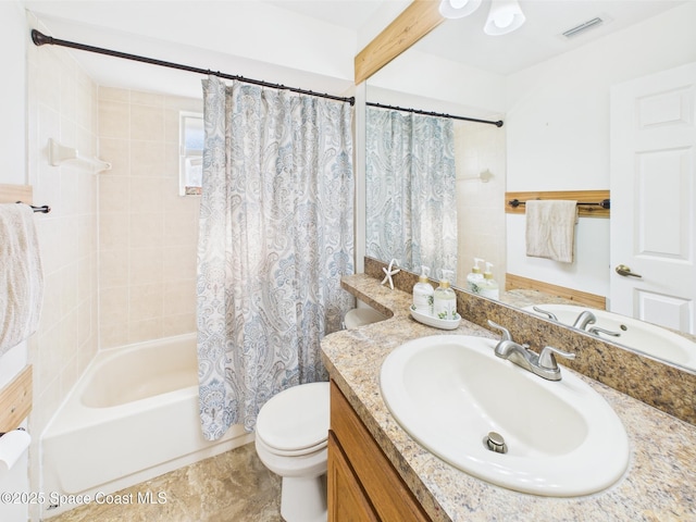 187 S Wimbrow Dr, Sebastian, FL 32958 - bathroom featuring toilet, vanity, and shower / tub combo