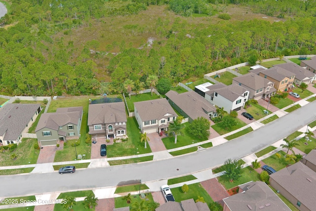 1403 Musgrass Cir, West Melbourne, FL 32904 - aerial perspective of suburban area featuring a forest