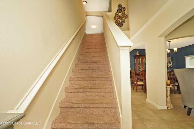 1403 Musgrass Cir, West Melbourne, FL 32904 - stairs with a chandelier and tile patterned floors
