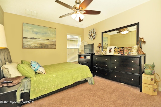 1403 Musgrass Cir, West Melbourne, FL 32904 - carpeted bedroom featuring ceiling fan