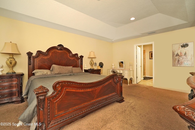 1403 Musgrass Cir, West Melbourne, FL 32904 - carpeted bedroom featuring a tray ceiling, recessed lighting, and baseboards