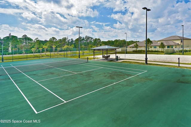 1403 Musgrass Cir, West Melbourne, FL 32904 - view of tennis court featuring a gazebo