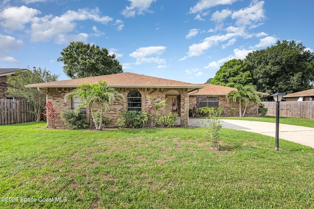 3137 Village Park Dr, Melbourne, FL 32934 - ranch-style home featuring brick siding, concrete driveway, and roof with shingles