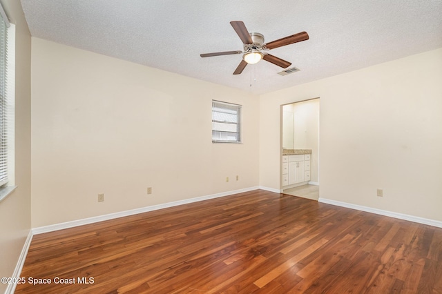 3137 Village Park Dr, Melbourne, FL 32934 - unfurnished room featuring wood finished floors, ceiling fan, and baseboards
