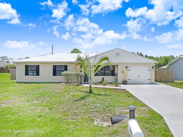 946 Stage St SE, Palm Bay, FL 32909 - ranch-style house featuring an attached garage, concrete driveway, and stucco siding