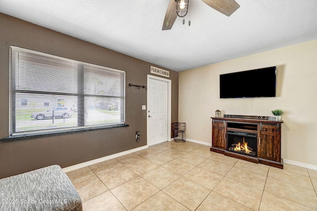 946 Stage St SE, Palm Bay, FL 32909 - living area with ceiling fan, healthy amount of natural light, and light tile patterned floors