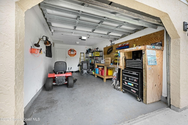 946 Stage St SE, Palm Bay, FL 32909 - garage with a textured wall and a garage door opener