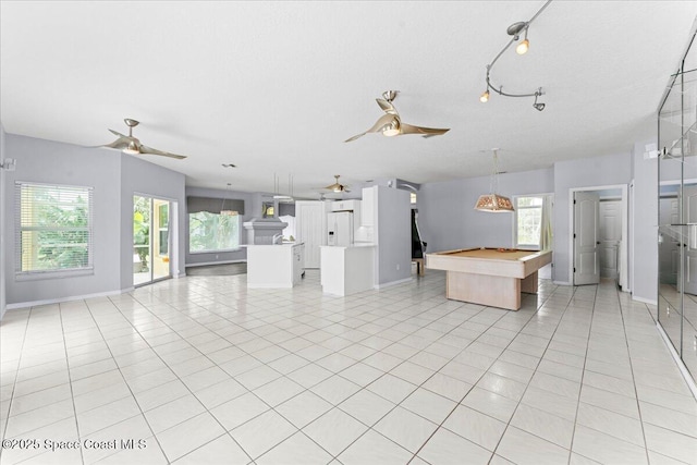 990 Harbor Pines Dr, Merritt Island, FL 32952 - kitchen featuring a ceiling fan, open floor plan, a kitchen island, and pool table