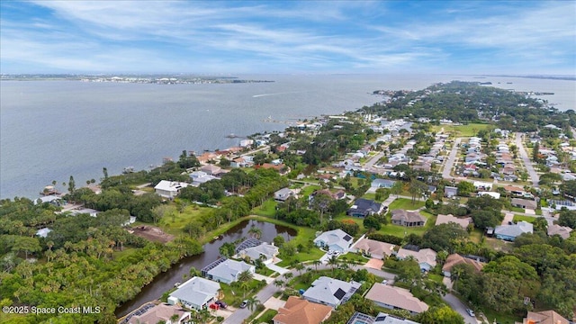 990 Harbor Pines Dr, Merritt Island, FL 32952 - aerial overview of property's location with a nearby body of water and nearby suburban area