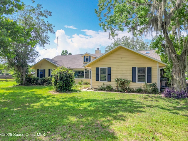 750 SW 91st Pl, Ocala, FL 34476 - view of front facade featuring a chimney