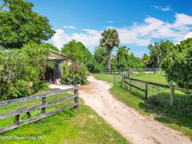 750 SW 91st Pl, Ocala, FL 34476 - view of dirt / gravel driveway with a view of countryside