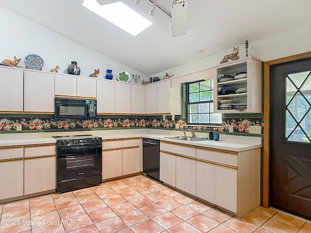 750 SW 91st Pl, Ocala, FL 34476 - kitchen with black appliances, light countertops, a sink, tasteful backsplash, and lofted ceiling