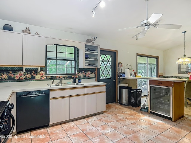 750 SW 91st Pl, Ocala, FL 34476 - kitchen featuring black dishwasher, a sink, beverage cooler, and plenty of natural light