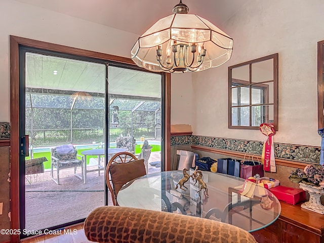 750 SW 91st Pl, Ocala, FL 34476 - dining room with a chandelier and wood finished floors
