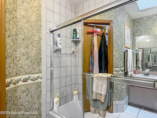 750 SW 91st Pl, Ocala, FL 34476 - full bathroom featuring tile patterned floors, wallpapered walls, vanity, bathing tub / shower combination, and a skylight