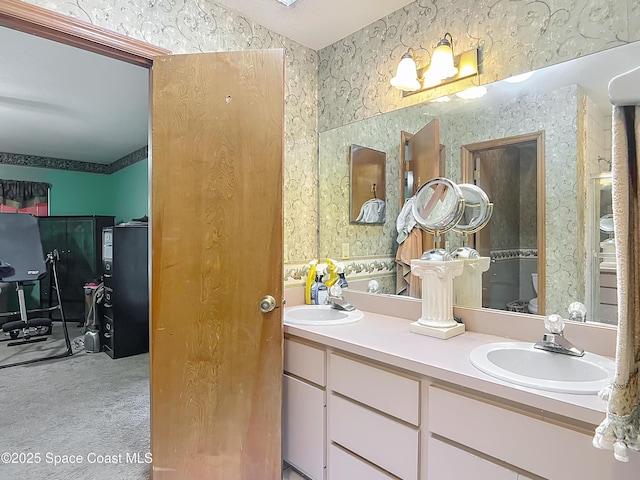 750 SW 91st Pl, Ocala, FL 34476 - bathroom with wallpapered walls and double vanity