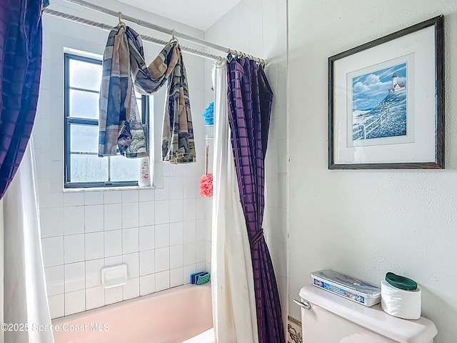 750 SW 91st Pl, Ocala, FL 34476 - full bathroom featuring shower / bathtub combination with curtain and toilet