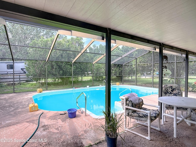 750 SW 91st Pl, Ocala, FL 34476 - swimming pool featuring a lanai and a patio