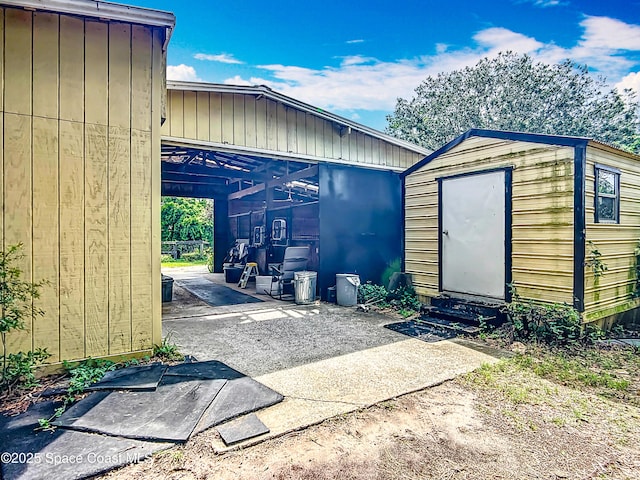 750 SW 91st Pl, Ocala, FL 34476 - garage featuring a shed