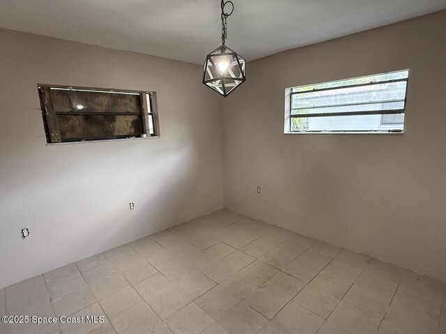 600 Byron Ave, Daytona Beach, FL 32114 - spare room with light tile patterned flooring