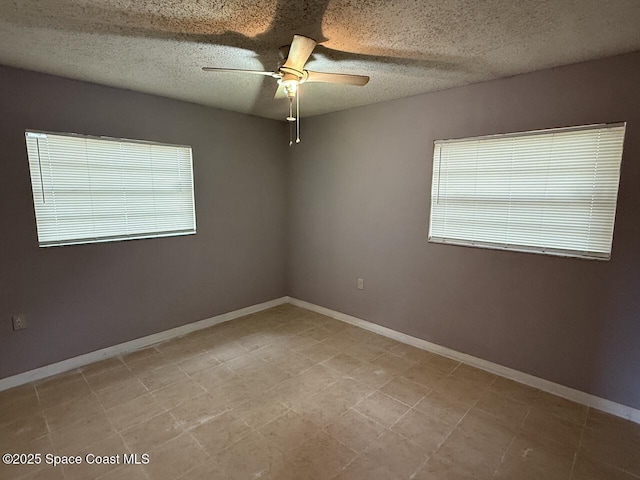 600 Byron Ave, Daytona Beach, FL 32114 - empty room featuring ceiling fan, baseboards, and a textured ceiling