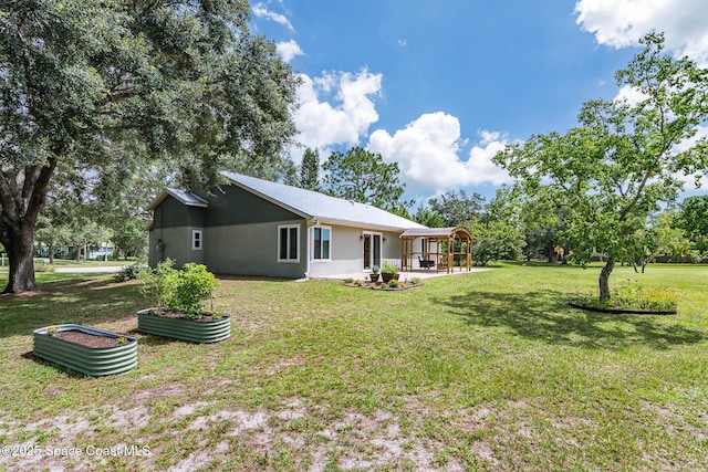 4027 Secretariat Ln, Malabar, FL 32950 - view of grassy yard featuring a gazebo and a patio area