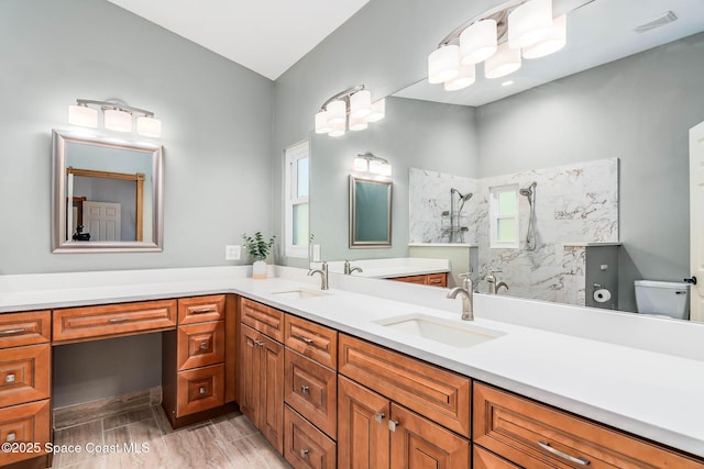 4027 Secretariat Ln, Malabar, FL 32950 - full bath with a walk in shower, double vanity, and toilet