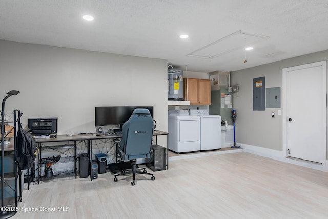 4027 Secretariat Ln, Malabar, FL 32950 - office featuring attic access, washer and clothes dryer, electric panel, light wood-style floors, and recessed lighting
