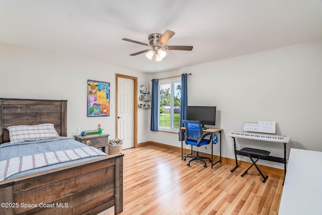 4027 Secretariat Ln, Malabar, FL 32950 - bedroom featuring wood finished floors, baseboards, and ceiling fan